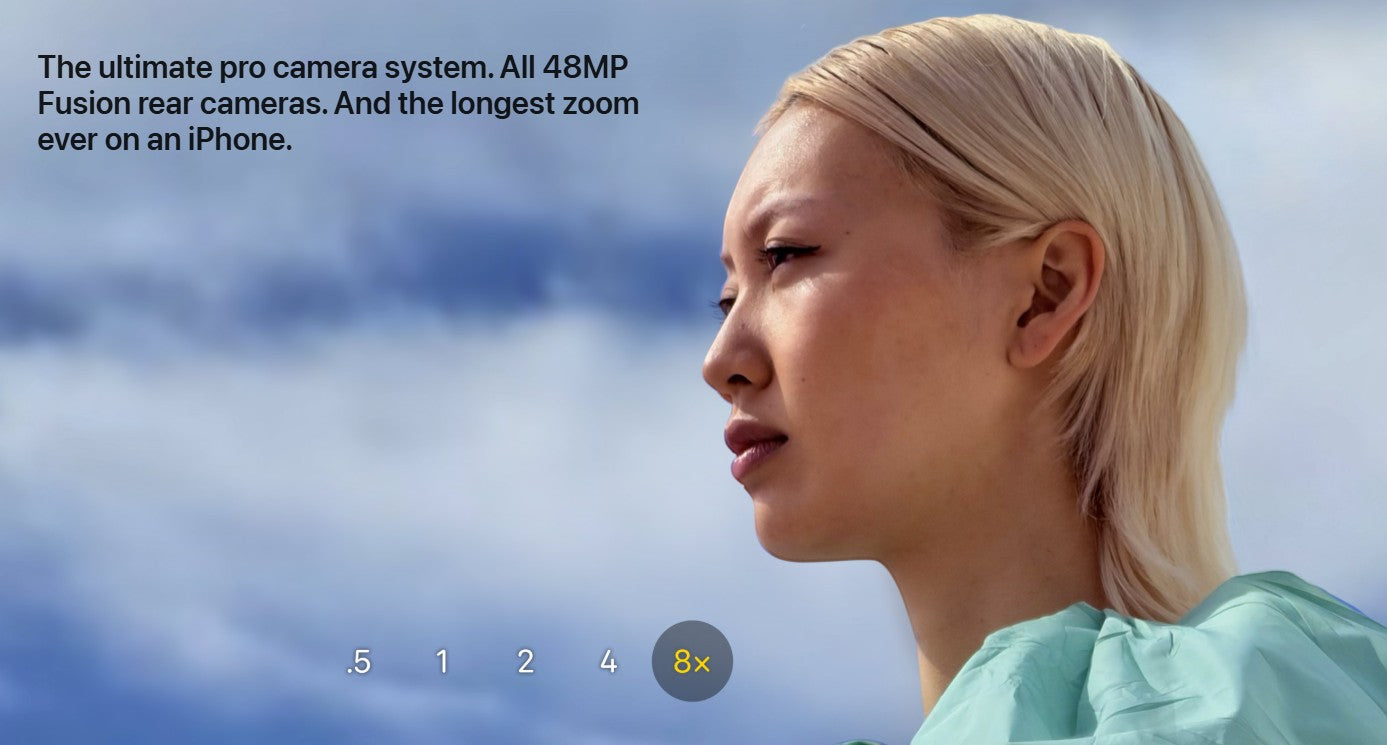 ASKY Digital iPhone 15 Pro with 48MP Fusion cameras and 8x zoom. Woman with blonde hair against a blue sky.